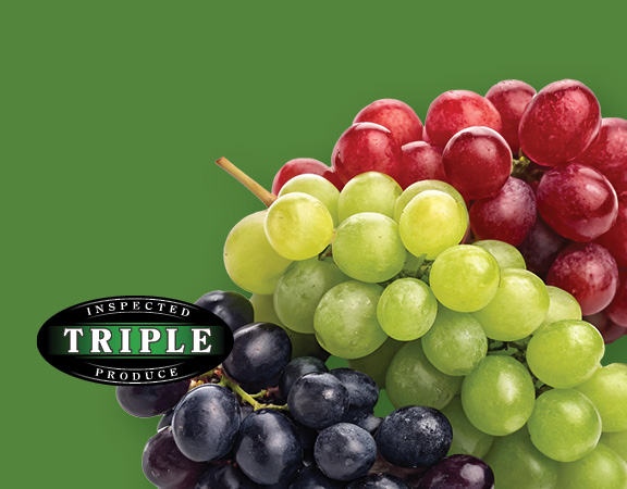 Grapes on green background